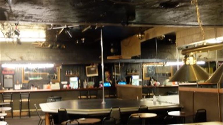 Main Room with Pool Table and Stage