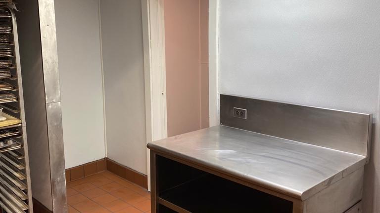 Kitchen with back storage room