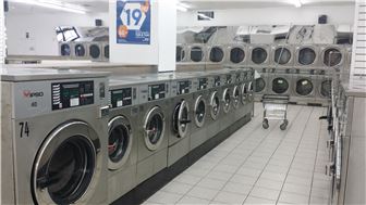 Laundromat with 4500 sf and 5 Units strip center for sale