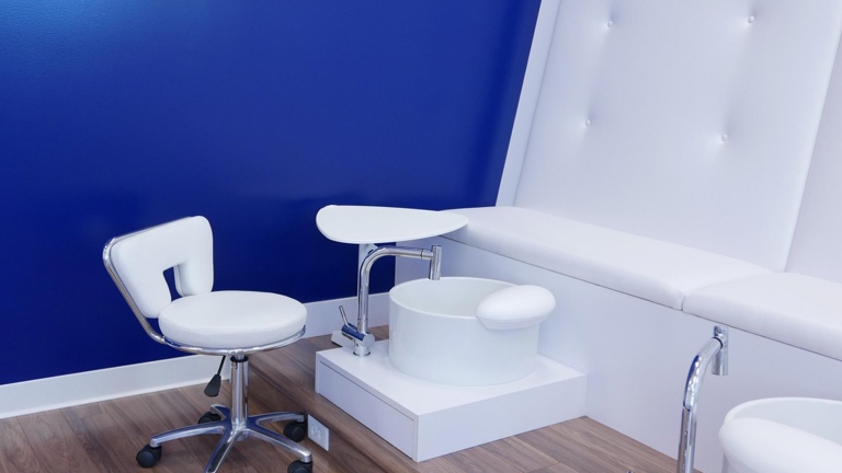 Custom pedicure benches with porcelain, bottom-draining tubs provide a safer, cleaner experience.