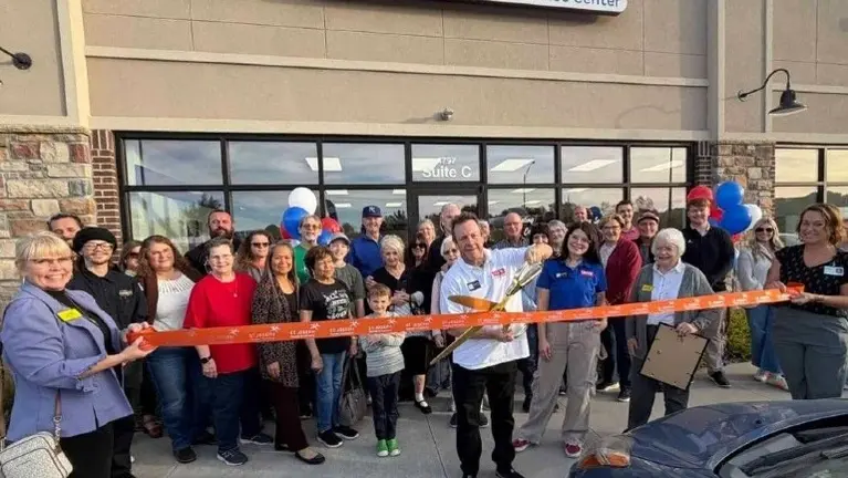 A clean and welcoming Qwik Pack & Ship storefront showcasing strong street visibility.