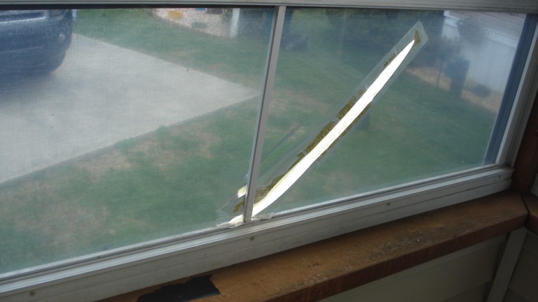Damaged Vinyl Panel Window