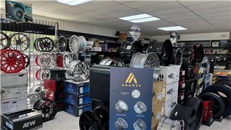 Mechanic Workshop with Wheel, Tires and Auto Parts Store