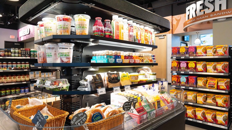 A tempting display of freshly made sandwiches and ready-to-eat meals, providing convenience for customers looking for quick and quality options.