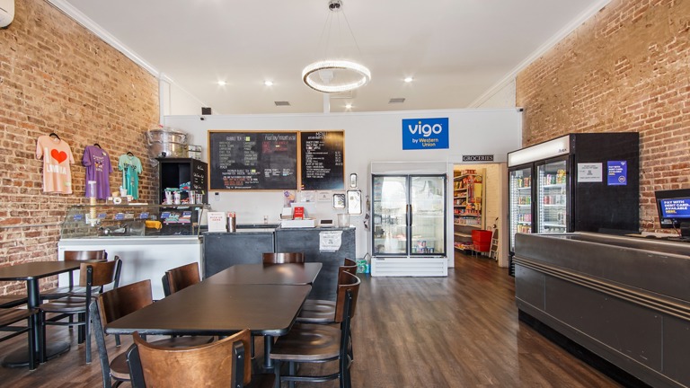 Front area with registers and cafe area.