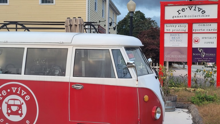 Outdoor community space with coffee truck.