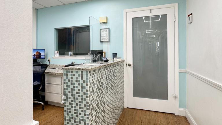 Front desk leading to patient waiting room.