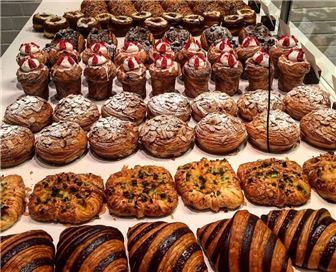 Growing artisanal bakery with retail café outlets