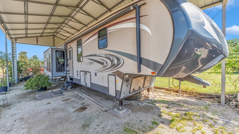Out of town owner/manager stays in RV