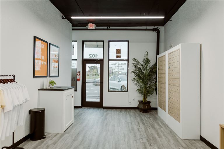 Clean, Inviting Customer Entrance w/ Natural Light