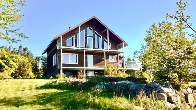 Versatile main lodge can be used for onsite staff housing, long-term rental, or expanded short-term rental capacity.