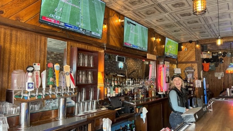 Tvs behind the bar with capability to play different games 