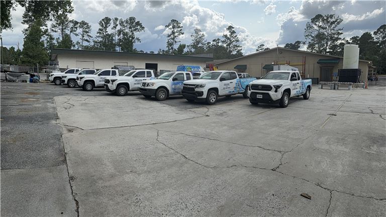 Service Vehicle Fleet and private, gated rear lot.