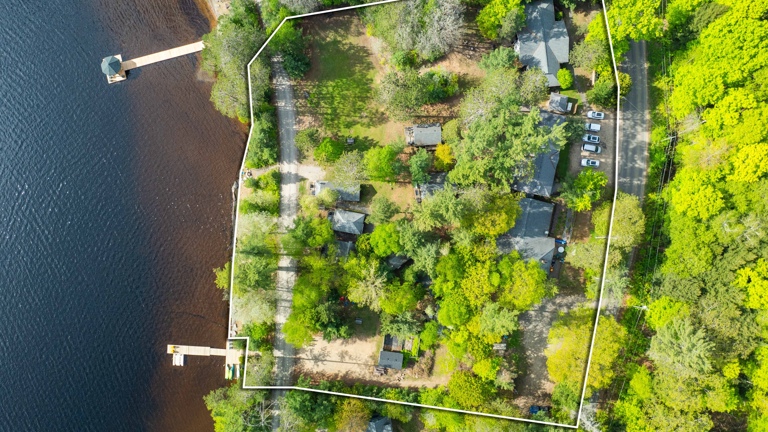 3.25 acres,16 rental units, lodge with kitchen and dining rooms,parking,2 fire pits, level lot