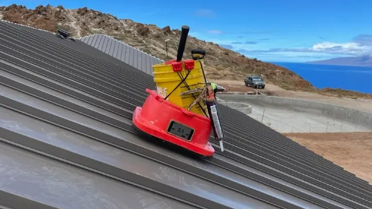 Bucket shown here attached to a steep slope roof 