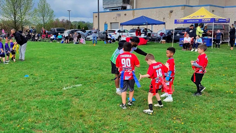 Out at the field - Spr25 Flag & Cheer