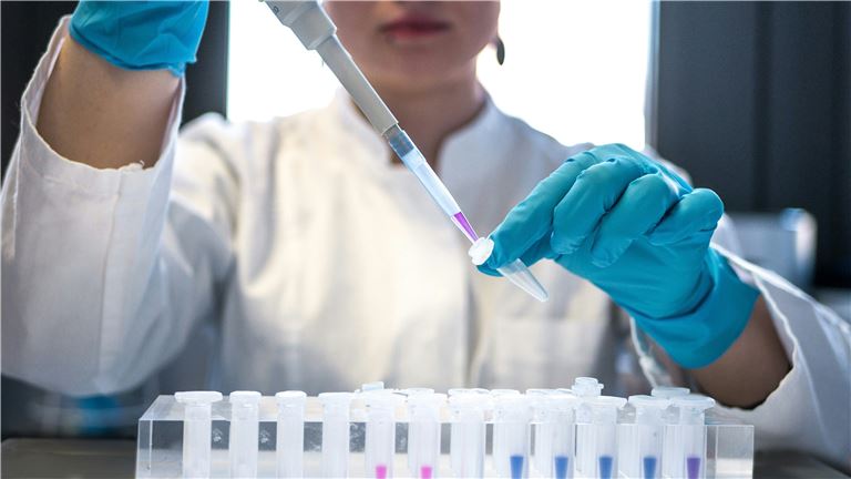 lab tech testing sample