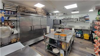 Pizza restaurant for sale with bar and patio