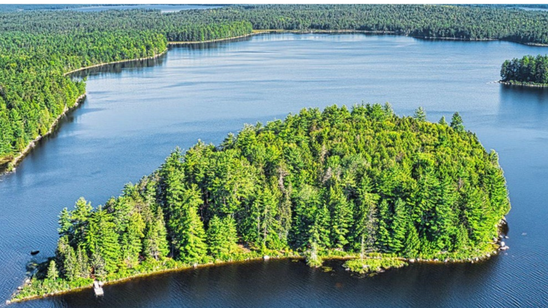 Private 8 acre island includes a boat house & parking on the mainland 