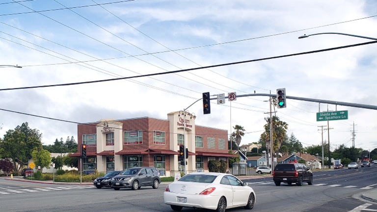 A look at the corner lot and the busy intersection. Over 10K of cars go by daily.