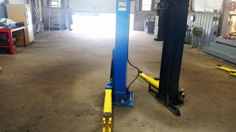 Western 9,000-lb & Atlas 12,000-lb 2-post lifts conveying