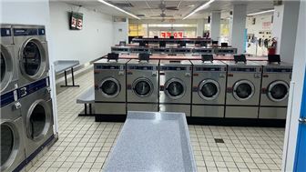 Several apartment complexes surrounding this laundromat for sale!