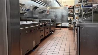 Corner Restaurant Spacious kitchen with a Long Hood & Patio