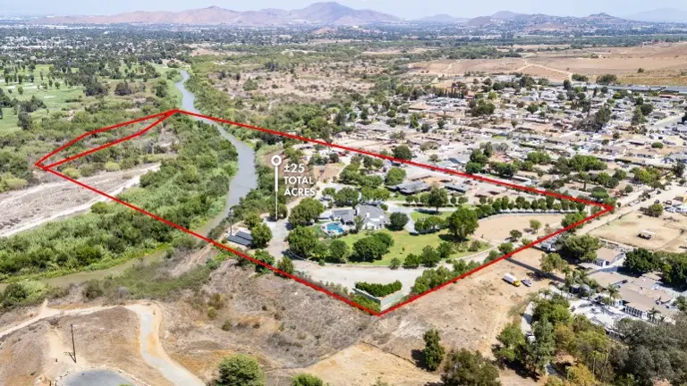 Aerial view of property w/ approximate boundary lines for the 24.76 acre parcel