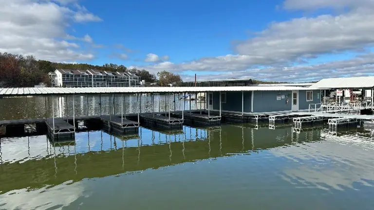 Covered boat slips and fishing house Covered boat slips and fishing house