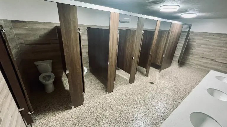 Massive, Accommodating Men and Women Bathrooms