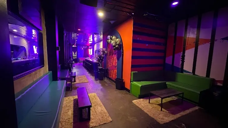 Flexible lounge space with multiple seating zones, ideal for group reservations and private events.