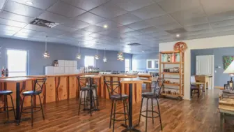 Turnkey Tasting Room, Rooftop Bar and Short Term Rental Unit!