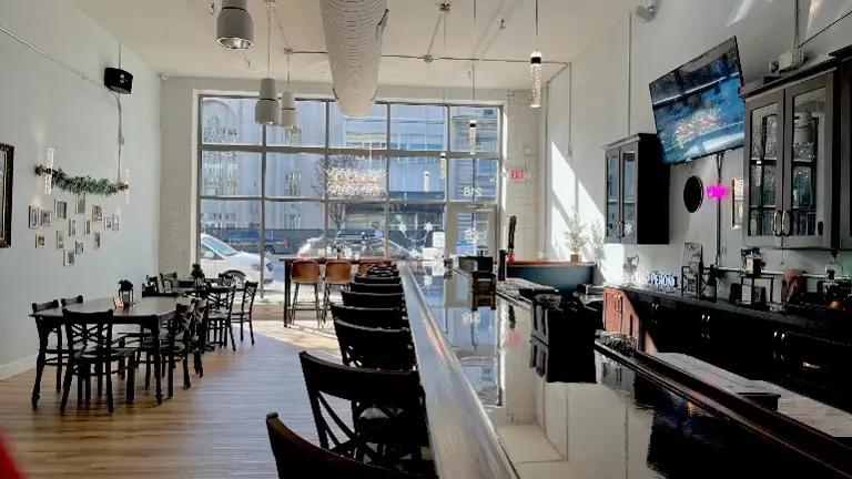 From the Kitchen Wall to Front Windows