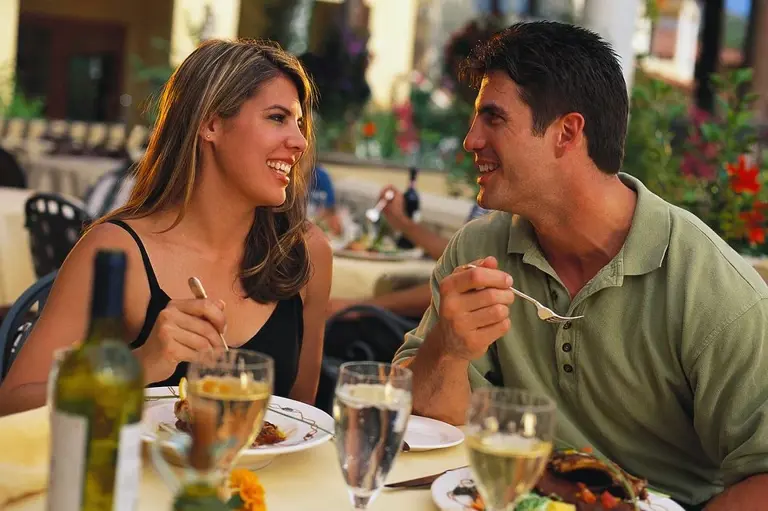 A couple dining at a restaurant.