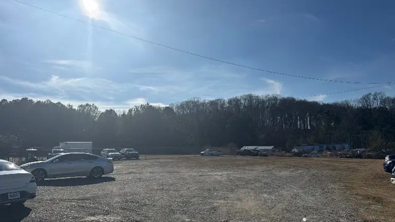 Open Space Behind Car Lot Open Space Behind Car Lot