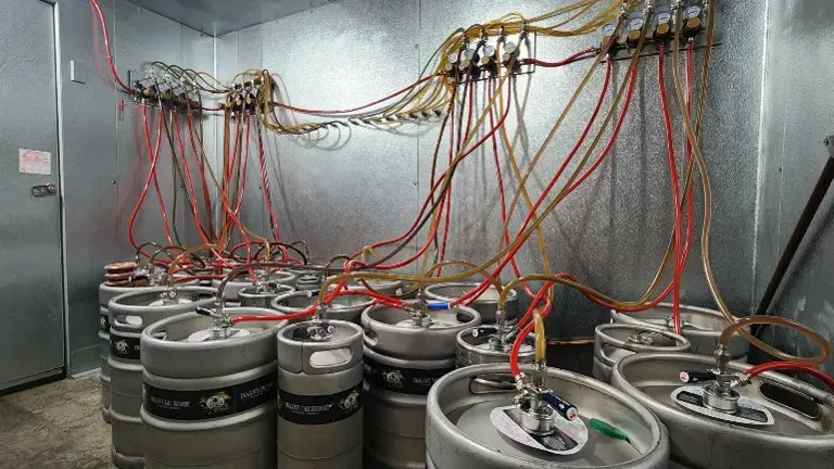 Tapped kegs in cooler