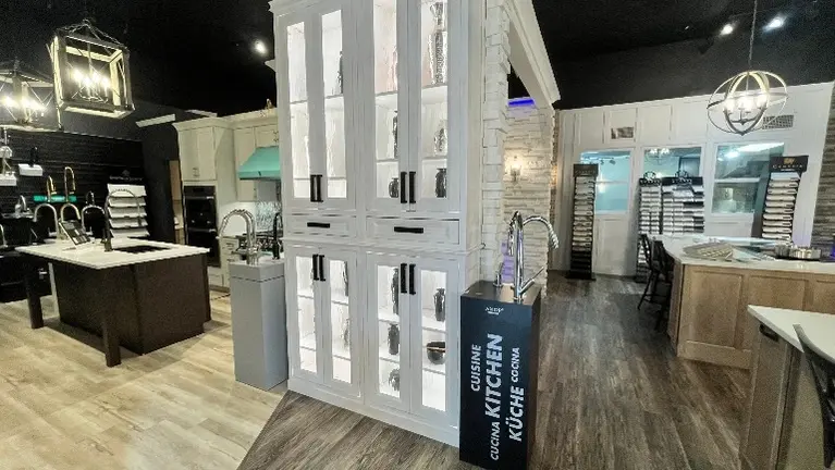 Many vinettes in the showroom including custom display cabinets for china or awards or antiques Many vinettes in the showroom including custom display cabinets for china or awards or antiques