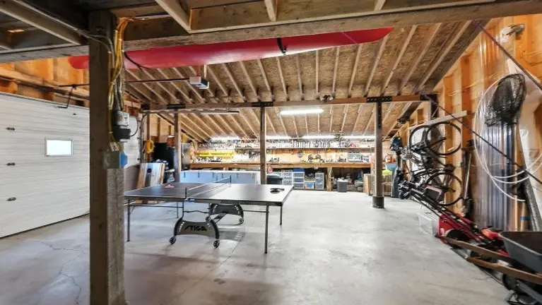 Attached 2+ car garage and work area