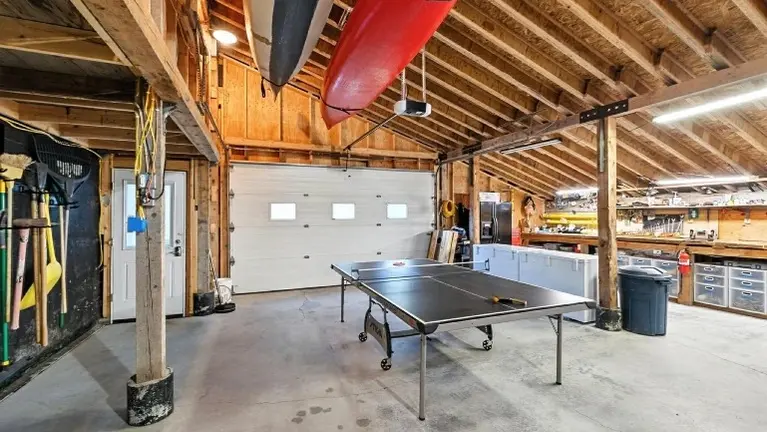 Attached 2+ car garage and work area