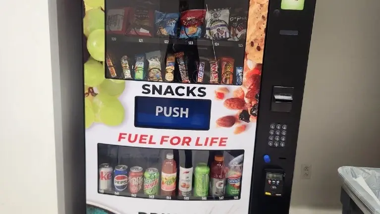 Seaga HY2200 combination vending machine — ADA compliant, energy-efficient, card-enabled, and owned free and clear.