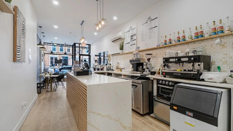 Espresso machine, workspace storage, marble-top counter service