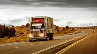 $100,000 NET Semi-Absentee Two Semi-Truck Transportation Company