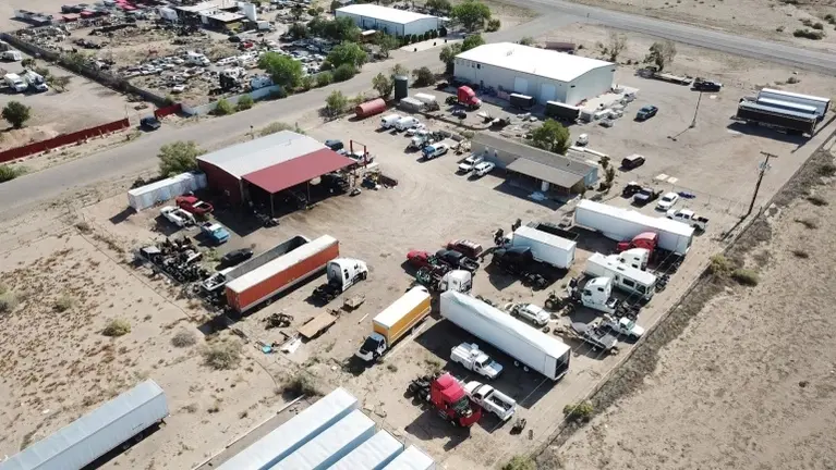 Over 1 acre of fenced and secured commercial property with ample room for trucks, trailers and fleet vehicles. Approximately 2,500 sq. ft. repair facility conv Over 1 acre of fenced and secured commercial property with ample room for trucks, trailers and fleet vehicles. Approximately 2,500 sq. ft. repair facility conv