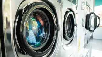 East Village NYC Absentee Laundromat with Property