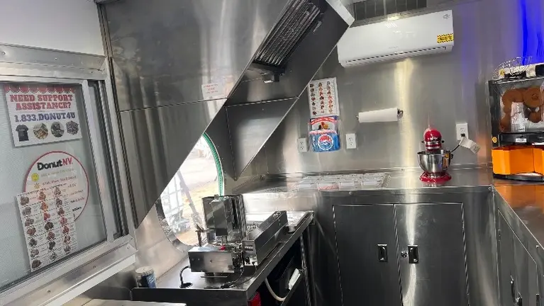 Cooking line and hood system Cooking line and hood system