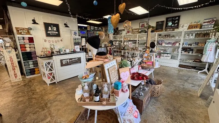 Retail and bar area in back from workshop area.
