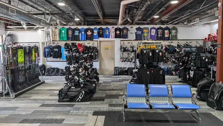 Skate fitting area, glove display