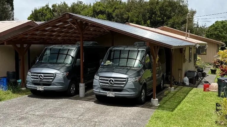 2 Sprinters in carport