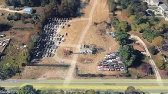 Open and operating salvage yard on busy road. And a 3 bed home