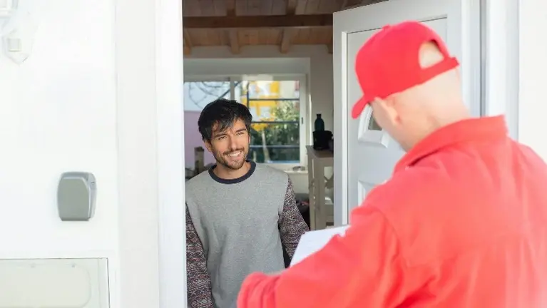 Home Services Representative Talking to Home Owner